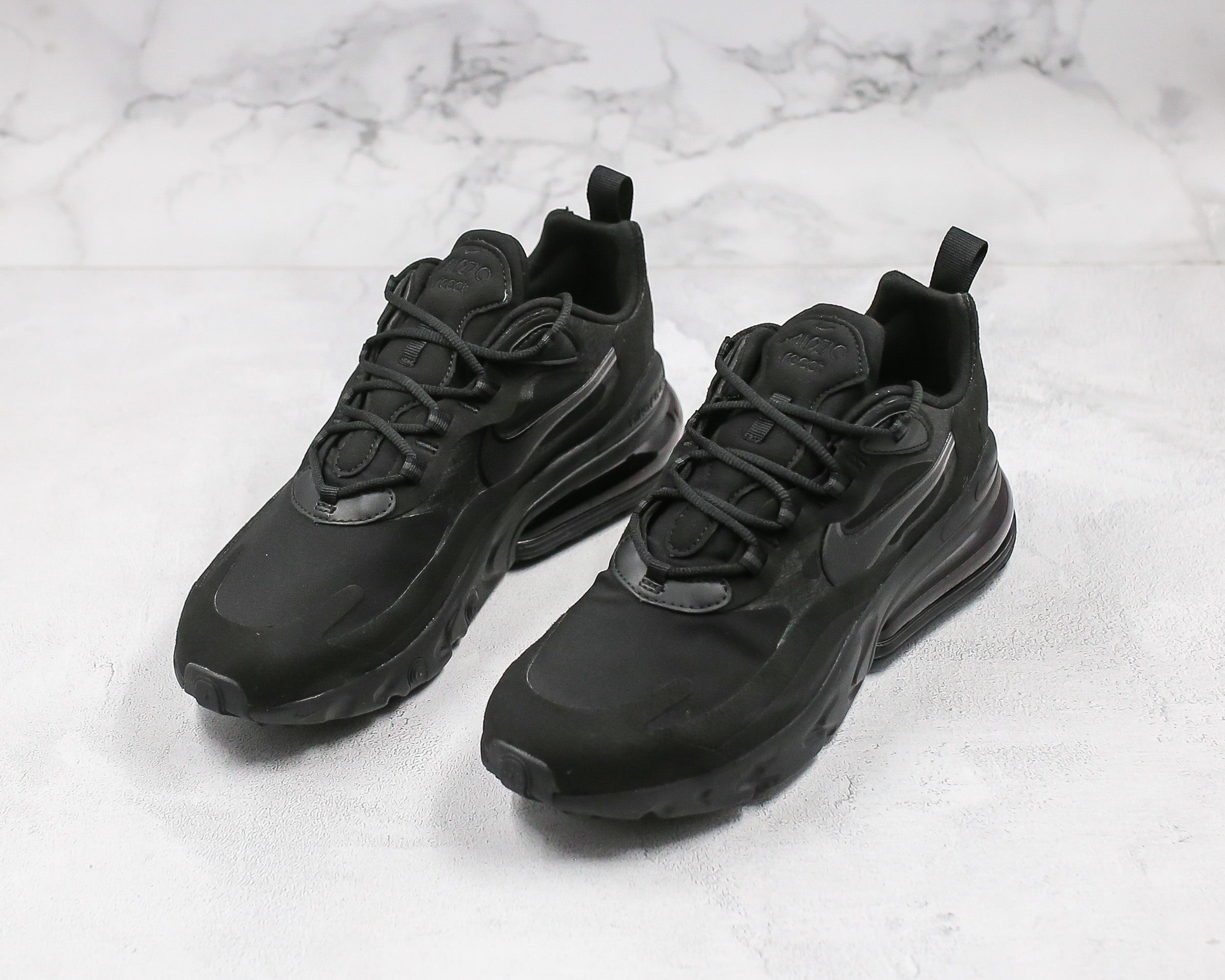 Nike reacts store triple black